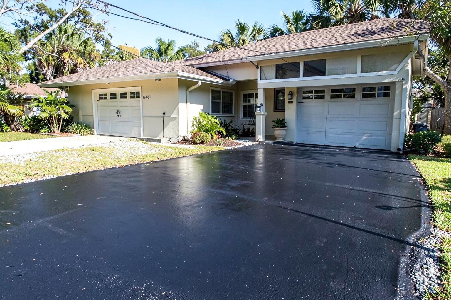 South Florida Paving crew paving asphalt in West Palm Beach, FL