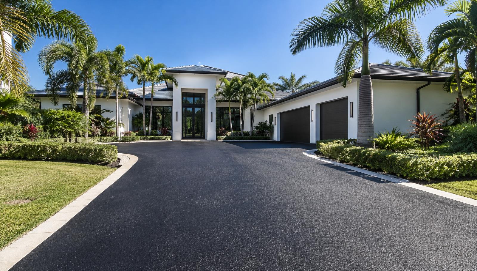 Freshly sealcoated asphalt driveway at a Plantation home